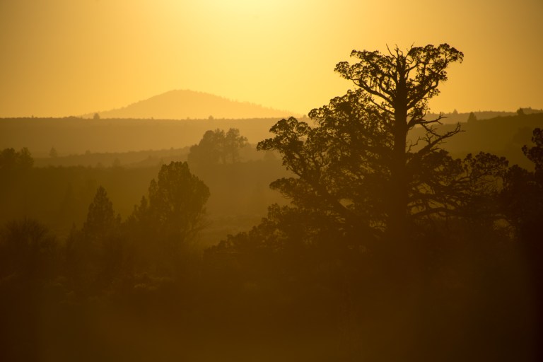 Cinder cone below the setting sun